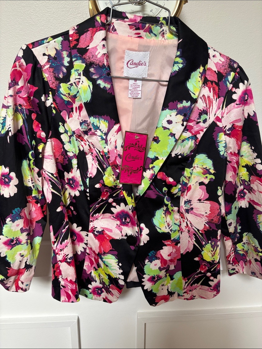 Candie's black multicolored floral print blazer featuring a single-button